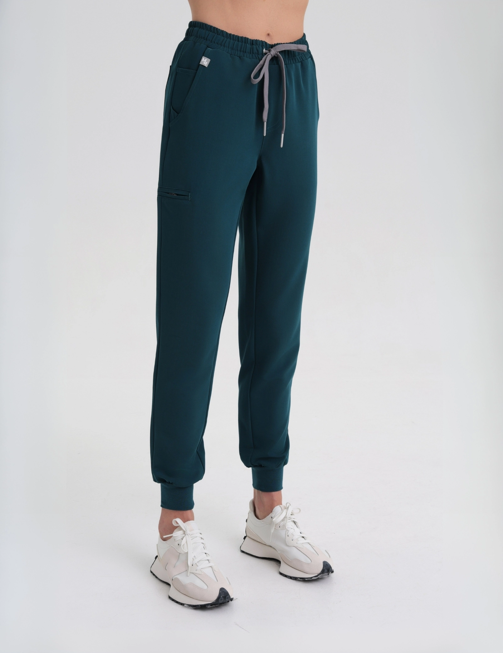 Pantaloni joggers pentru femei - DEEP GREEN Pantaloni joggers pentru femei - DEEP GREEN
